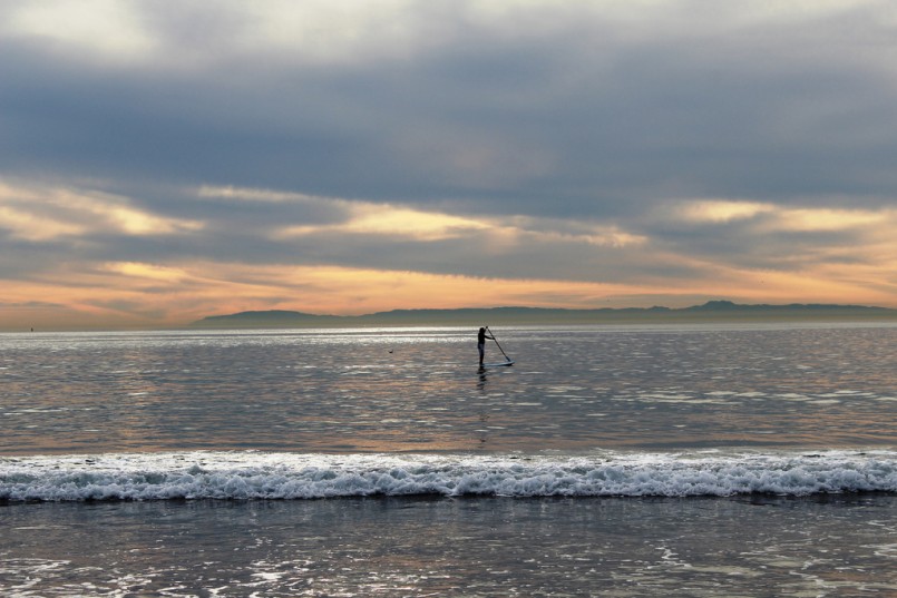sunset ocean paddle boarding in Newport