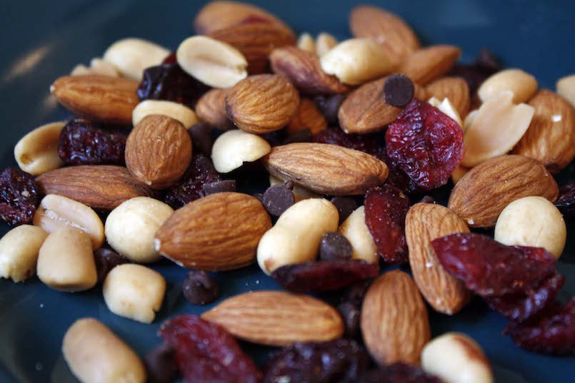 trailmix with almonds peanuts and dried cranberries