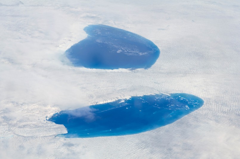 Supraglacial Lakes over the Ice Sheet in Greenland - A supraglacial lake is any pond of liquid water on the top of a glacier. They may reach kilometers in diameter and be several meters deep.