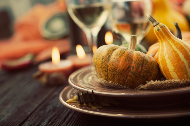 Autumn table setting with pumpkins. Thanksgiving dinner and autumn decoration