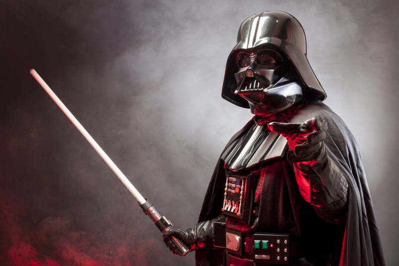 Portrait of Darth Vader costume replica with grab hand and sword
