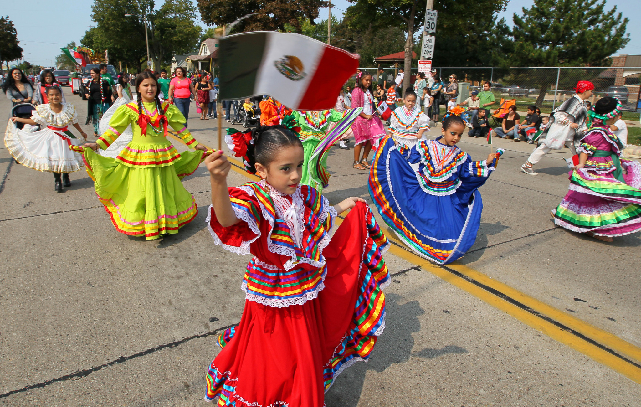September 16, 2012 Photographs from the Mexican independence day parade. It kicked off at S.20th and Oklahoma and ended at the UMOS center at 2701 S. Chase Ave. The event celebrates the Mexican War of Independence, from Spanish colonial authority. Dancers in traditional Mexican dresses filled the street with color as they passed. MICHAEL SEARS/MSEARS@JOURNALSENTINEL.COM