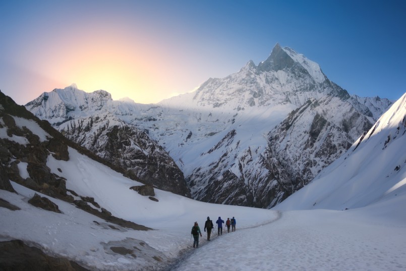 A group of trekkers are walking in the mountains. Nepal, Himalayas, Annapurna region