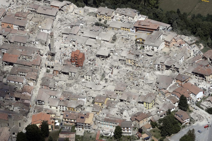 This aerial photo shows the damaged buildings in the town of Amatrice, central Italy, after an earthquake, Wednesday, Aug. 24, 2016. The magnitude 6 quake struck at 3:36 a.m. (0136 GMT) and was felt across a broad swath of central Italy, including Rome where residents of the capital felt a long swaying followed by aftershocks. (AP Photo/Gregorio Borgia)           NYTCREDIT: Gregorio Borgia/Associated Press