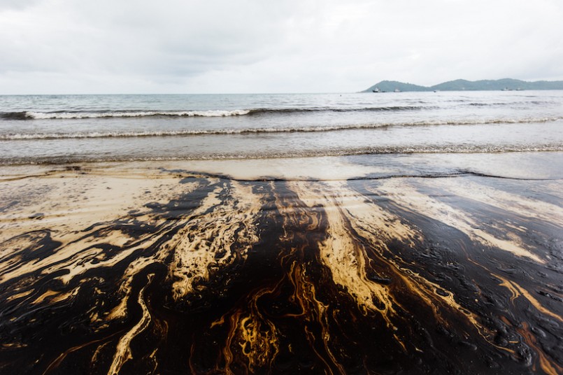 crude oil on oil spill accident on Ao Prao Beach at Samet island on July 31,2013 in Rayong,Thailand