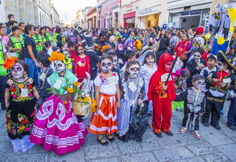 Unknown participants on a carnival of the Day of the Dead in Oaxaca, Mexico